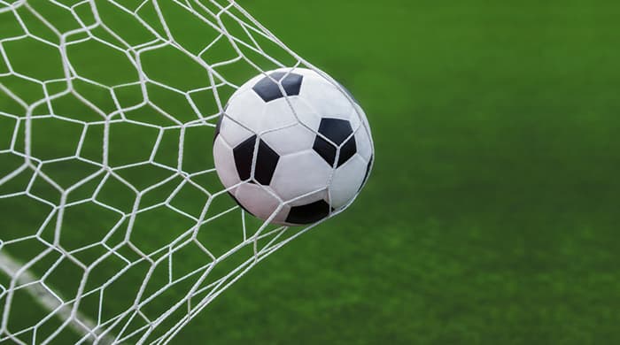 Football players celebrating on the pitch